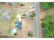 Aerial shot of property featuring pool and long driveway surrounded by fencing at 1158 Wildgame Rd, Summerville, SC 29486