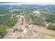 Beautiful acreage with private pool and large lawn surrounded by mature trees and a winding driveway at 1158 Wildgame Rd, Summerville, SC 29486