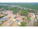 Expansive property with manicured grounds featuring a pool, fencing, and mature trees, very private at 1158 Wildgame Rd, Summerville, SC 29486
