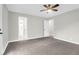 Bedroom features carpet, a ceiling fan, and two doors at 1158 Wildgame Rd, Summerville, SC 29486