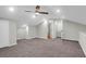 Neutral bedroom featuring soft carpet, a ceiling fan, and access to an en suite bathroom at 1158 Wildgame Rd, Summerville, SC 29486