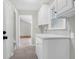 Hallway featuring updated gray walls and opening to living room at 1158 Wildgame Rd, Summerville, SC 29486