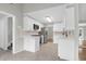 Bright kitchen with white cabinets, stainless steel appliances, and a view to the backyard at 1158 Wildgame Rd, Summerville, SC 29486