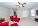 Bright bonus room with neutral carpeting, a ceiling fan, and comfortable seating in red at 1166 Elliotts Cut Dr, Charleston, SC 29412