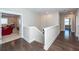 Hallway with dark hardwood floors and access to an additional living space at 1166 Elliotts Cut Dr, Charleston, SC 29412