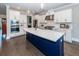 Modern kitchen with stainless steel appliances, custom cabinets, and large island at 1166 Elliotts Cut Dr, Charleston, SC 29412