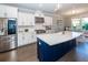 Modern kitchen with stainless steel appliances, custom cabinets, and large island at 1166 Elliotts Cut Dr, Charleston, SC 29412