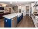 Open-concept kitchen with island and stainless appliances, with view to living room at 1166 Elliotts Cut Dr, Charleston, SC 29412