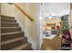 Cozy living room and staircase features plush carpeting and a view of the decorated living space at 120 Luden Dr # C, Summerville, SC 29483