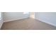 A light-filled empty bedroom with neutral carpet and white trim at 125 Cantona Dr, Summerville, SC 29483