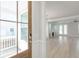 Bright entryway flows into an open-concept living space, complete with hardwood floors and a cozy fireplace at 125 Cantona Dr, Summerville, SC 29483