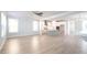 Open-concept living area transitions to a modern kitchen, with a stylish island and stainless-steel appliances at 125 Cantona Dr, Summerville, SC 29483