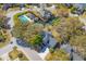 Aerial view of the property with a pool, waterway, and mature trees at 1324 Southlake Dr, Mount Pleasant, SC 29464