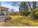 Lush backyard with a well-maintained lawn, established landscaping, and mature trees at 1324 Southlake Dr, Mount Pleasant, SC 29464