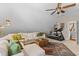 Attic bonus room features a treadmill and built-in shelving at 1324 Southlake Dr, Mount Pleasant, SC 29464