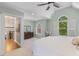 Airy main bedroom with vaulted ceiling, large windows, and dresser at 1324 Southlake Dr, Mount Pleasant, SC 29464