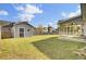 Spacious backyard featuring a shed and screened-in porch, perfect for outdoor living and storage at 136 Rosario Dr, Summerville, SC 29483