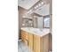 Well-lit bathroom featuring a double sink vanity, large mirror, and ample counter space, perfect for a growing Gathering at 136 Rosario Dr, Summerville, SC 29483