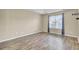 Bright bedroom with wood-look flooring and a large window with curtains at 136 Rosario Dr, Summerville, SC 29483
