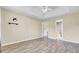 Spacious bedroom features wood-look flooring and a ceiling fan, ready for personalization and comfortable living at 136 Rosario Dr, Summerville, SC 29483