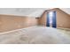 Bonus room with slanted ceilings, carpet and window with curtains at 136 Rosario Dr, Summerville, SC 29483