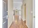 Inviting foyer with hardwood floors, seamlessly connecting to the spacious living area with a ceiling fan at 136 Rosario Dr, Summerville, SC 29483
