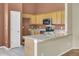 Spacious kitchen with granite countertops, stainless steel appliances, and ample cabinet space at 136 Rosario Dr, Summerville, SC 29483