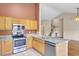 Kitchen with stainless steel appliances, granite countertops and tile flooring at 136 Rosario Dr, Summerville, SC 29483