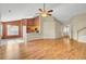 Open-concept living space showcasing seamless flow with wood floors and natural light from nearby rooms at 136 Rosario Dr, Summerville, SC 29483