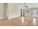 Bright and airy living room featuring beautiful floors, a ceiling fan, and a sliding glass door at 136 Rosario Dr, Summerville, SC 29483