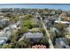 Beautiful aerial view of homes in a neighborhood near the water, with mature trees at 14 Greenhill St, Charleston, SC 29401