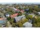Beautiful aerial view of a neighborhood with mature trees and other houses in the background at 14 Greenhill St, Charleston, SC 29401