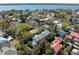 Beautiful aerial view of homes in a neighborhood with mature trees, and water in the background at 14 Greenhill St, Charleston, SC 29401