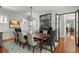Dining room with a large table, hardwood floors, and view of living room at 14 Greenhill St, Charleston, SC 29401