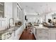 Spacious kitchen with a farmhouse sink, marble countertops, and a clear view to the living space at 14 Greenhill St, Charleston, SC 29401