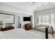 This bedroom has a seating area, natural light, and hardwood floors at 14 Greenhill St, Charleston, SC 29401