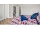 This bedroom includes an ensuite bathroom, closet, and cozy bed at 1427 Homecoming Blvd, Ravenel, SC 29470