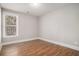 Bedroom featuring a window, neutral paint and wood flooring at 1427 Homecoming Blvd, Ravenel, SC 29470