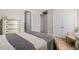 This bedroom boasts a stylish aesthetic and seamless flow into the en-suite bathroom at 1427 Homecoming Blvd, Ravenel, SC 29470