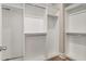 This primary closet offers modular and adjustable shelves for clothing and wardrobe storage at 1427 Homecoming Blvd, Ravenel, SC 29470