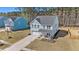 Charming home with a front porch, well-manicured lawn, and a two-car garage in a Gathering-friendly community at 1427 Homecoming Blvd, Ravenel, SC 29470