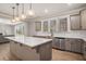 Stylish kitchen with center island, stainless steel appliances, and plenty of natural light at 1427 Homecoming Blvd, Ravenel, SC 29470
