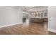 Open living area flows into kitchen, featuring island and access to outdoor space at 1427 Homecoming Blvd, Ravenel, SC 29470