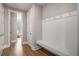 Mudroom complete with built-in bench and storage hooks, for ultimate organization at 1427 Homecoming Blvd, Ravenel, SC 29470