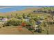 Charming home nestled among mature trees with views of the marsh and river at 1521 Hurtes Island Dr, Charleston, SC 29407
