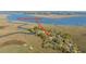 Aerial view with address of home surrounded by marshland and a waterway, highlighting its private setting at 1521 Hurtes Island Dr, Charleston, SC 29407