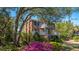 Beautiful brick home with dual back porches and lush landscaping at 1521 Hurtes Island Dr, Charleston, SC 29407