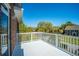 Outdoor balcony offers scenic views of the neighborhood surrounded by mature trees at 1521 Hurtes Island Dr, Charleston, SC 29407