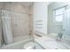 Inviting bathroom with vanity, toilet and shower/tub combo featuring neutral accents at 1521 Hurtes Island Dr, Charleston, SC 29407