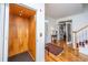 Elegant foyer featuring a convenient residential elevator, hardwood floors, and staircase at 1521 Hurtes Island Dr, Charleston, SC 29407